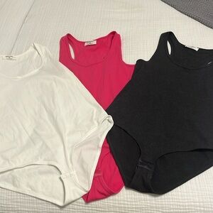 Pink, White, and Gray Bodysuits *see size info*